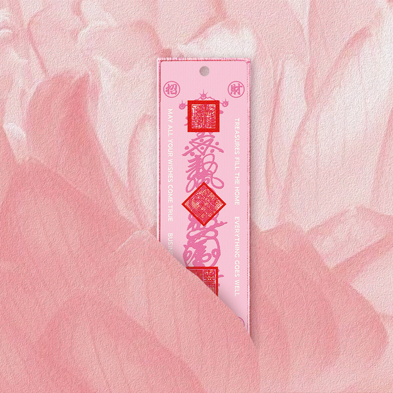 ShenBox blessing charm among petals